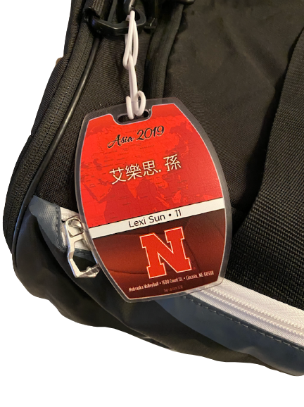 Lexi Sun Nebraska Volleyball Player Exclusive Travel Duffel with 2019 Asia Trip Player Travel Tag